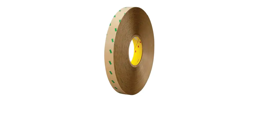 Roll of 3M 950 5 mil Laminating Adhesive on brown kraft paper liner with green 3M logo pattern.