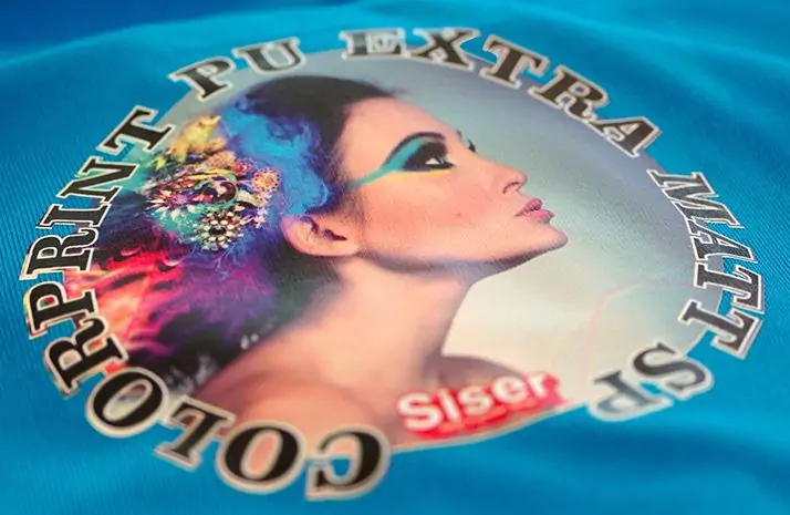 Siser ColorPrint PU Extra heat transfer vinyl applied to a blue textured fabric
