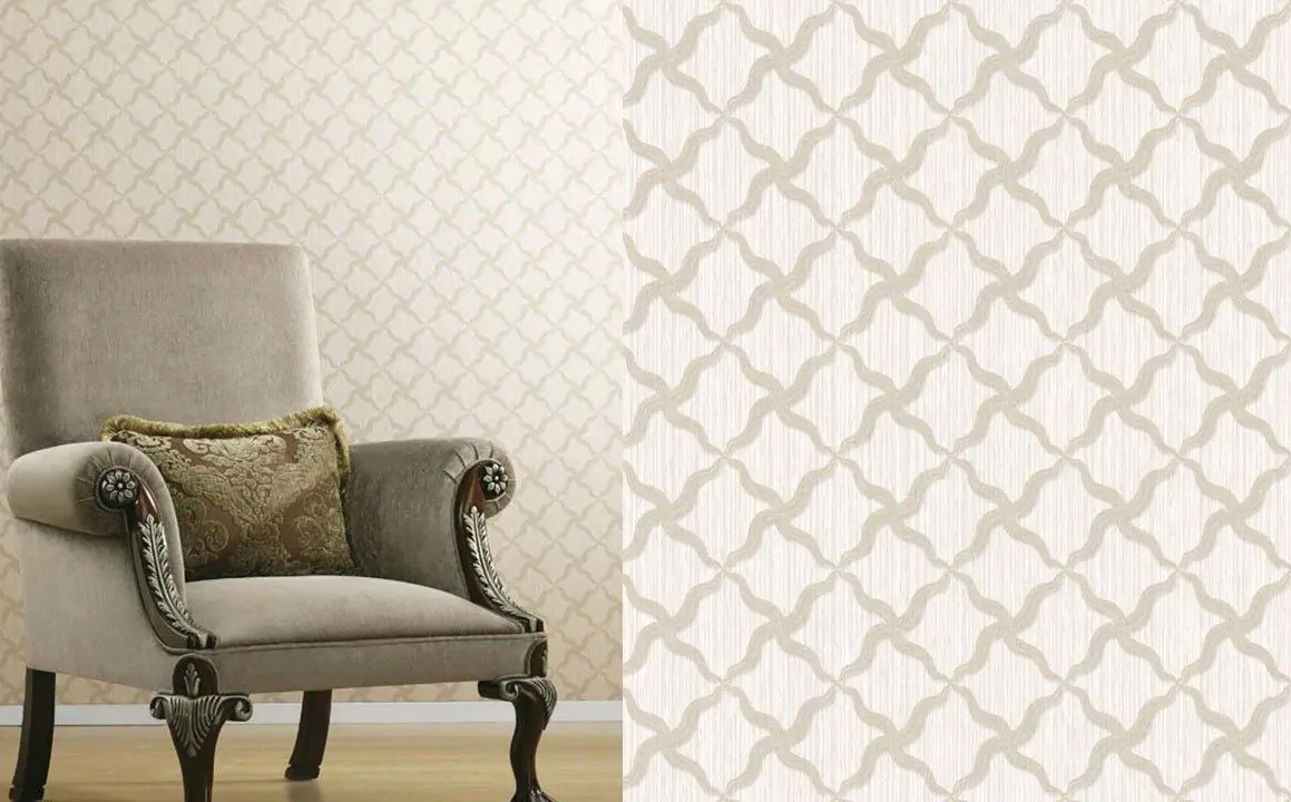 Grey Chair with a criss cross design on the wall 