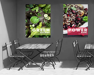 A bistro showing posters of food on the walls.