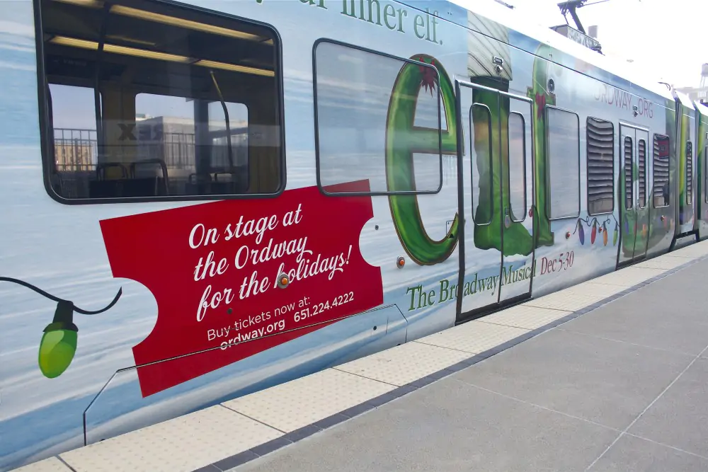 Train wrapped in Christmas-themed film and covered in 3M 8519 Lustre Overlaminate