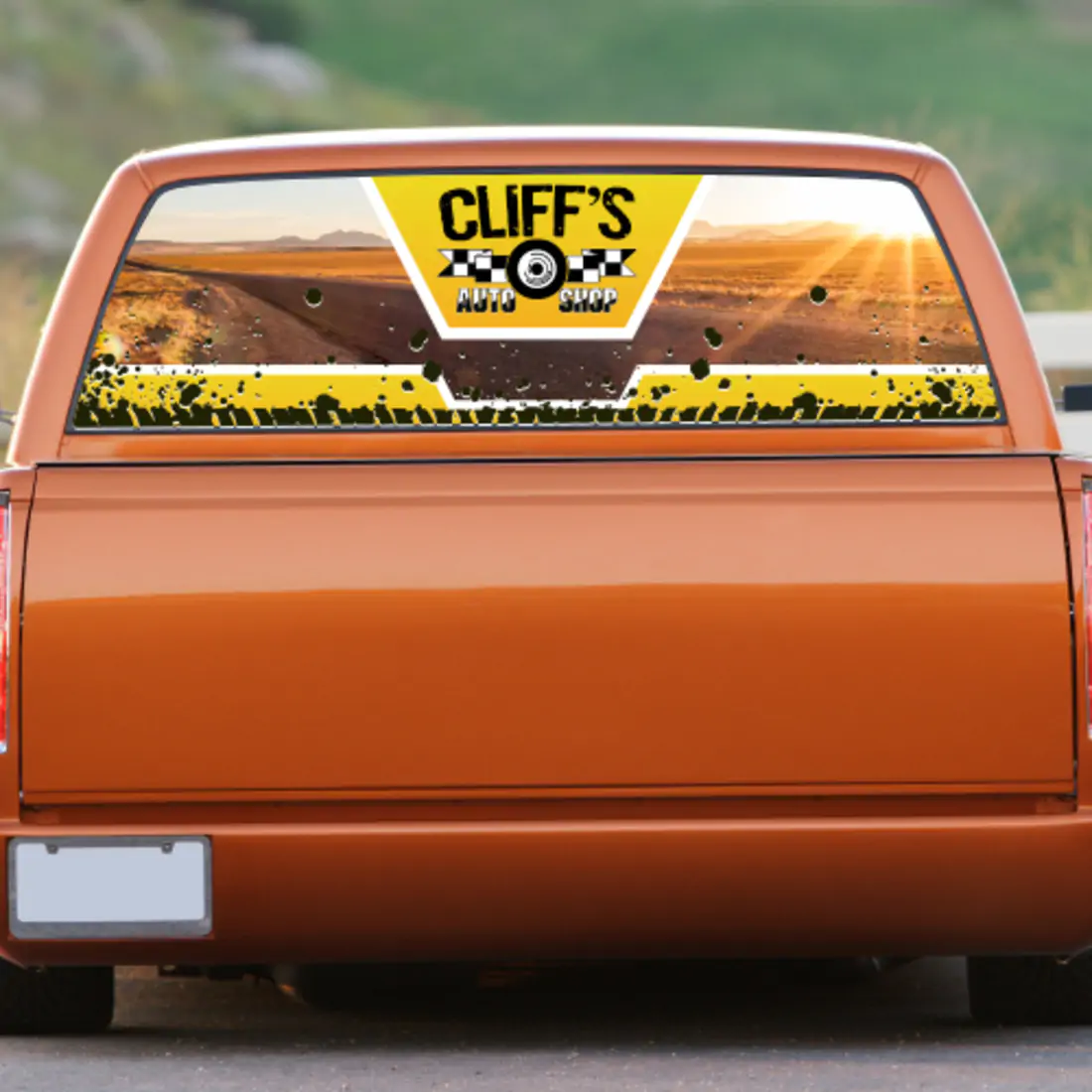 Orange pickup truck wrapped with Cliff's Autoshop design and covered in 8914 Gloss Clear Overlaminate