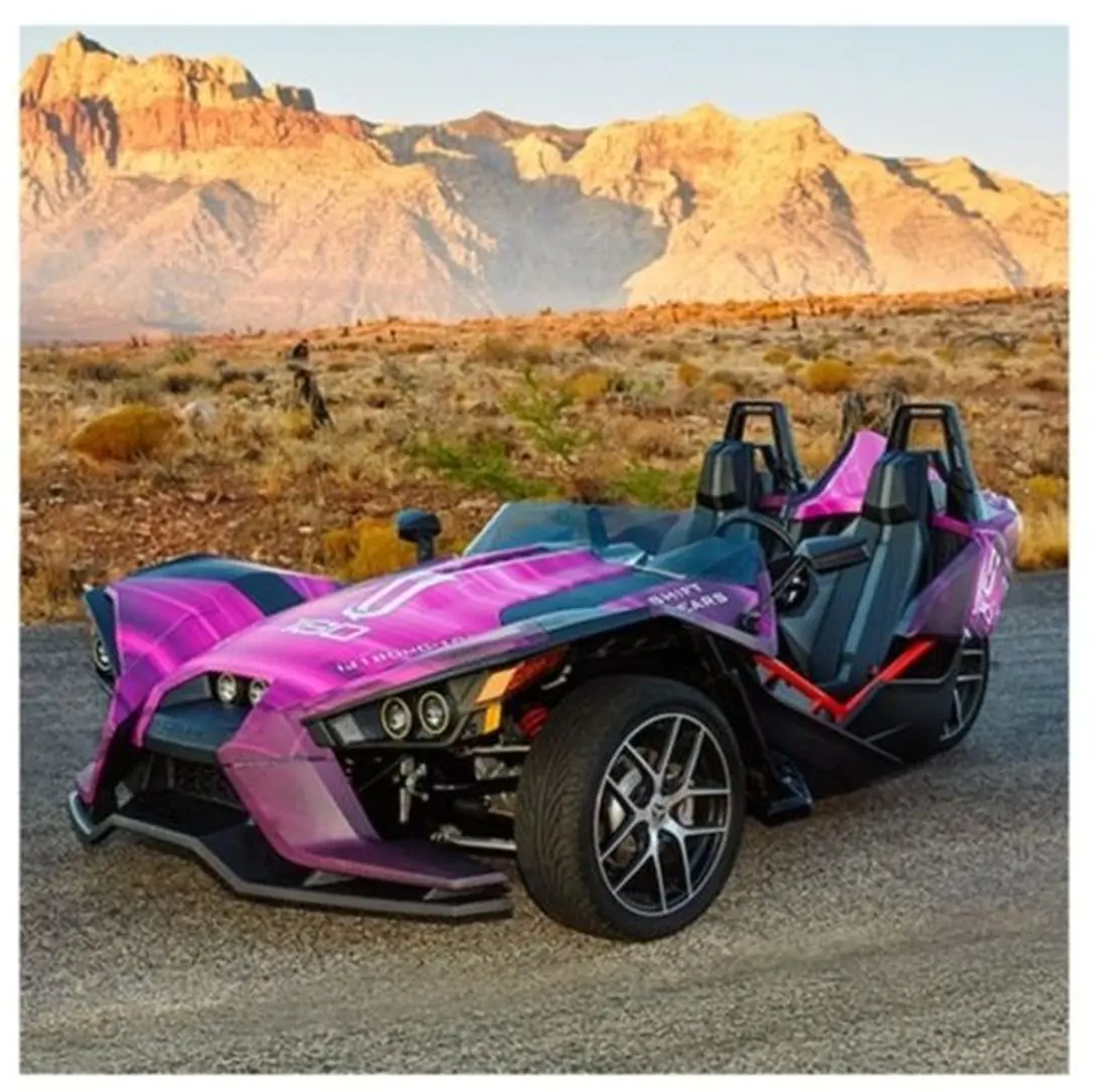 IJ180mC-10-UR Cast Ultra Removable in purple around a sports type car in front of rock mountains 