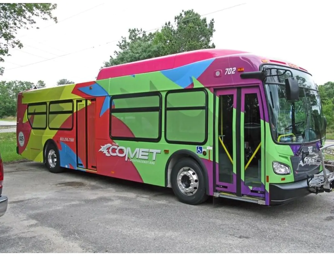 Bus wrapped in colourful graphic with 3M 180mC Colour Wrap Film.