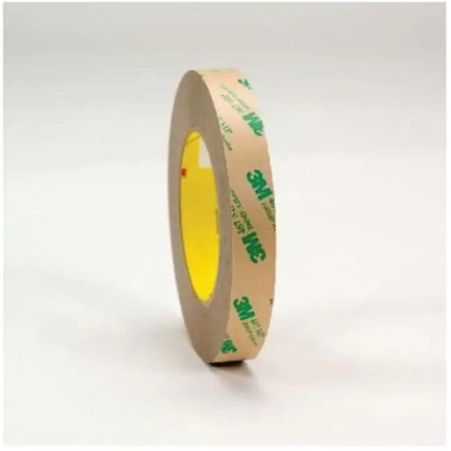 Brown roll of 3M 467MP Adhesive Transfer Tape with green 3M logo pattern.