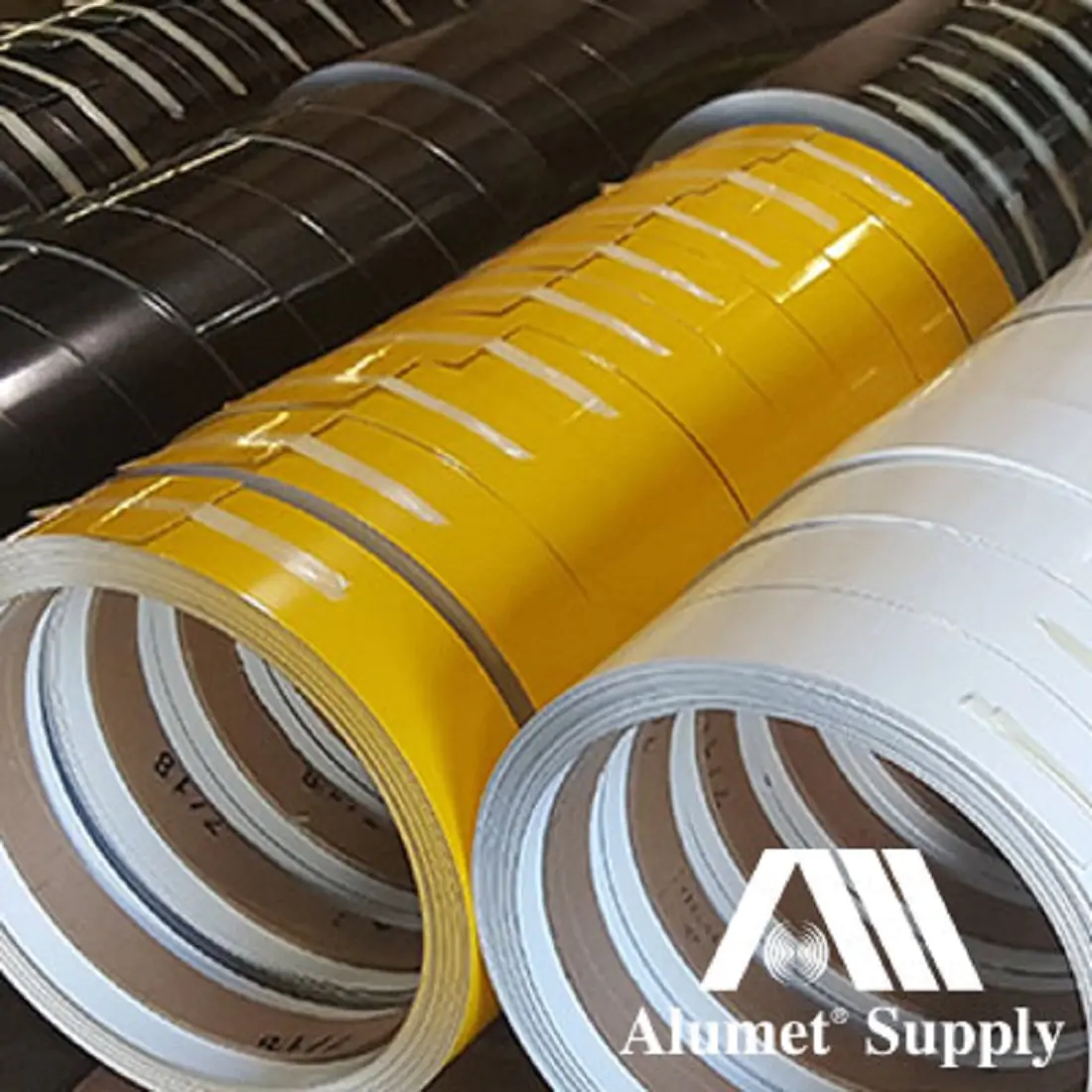 Black, yellow and white Alumet Aluminum Channel Coils.
