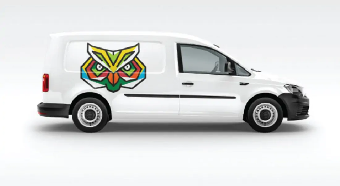 White van with a yellow, blue, green, orange animal. SC 950 Cast Coloured
