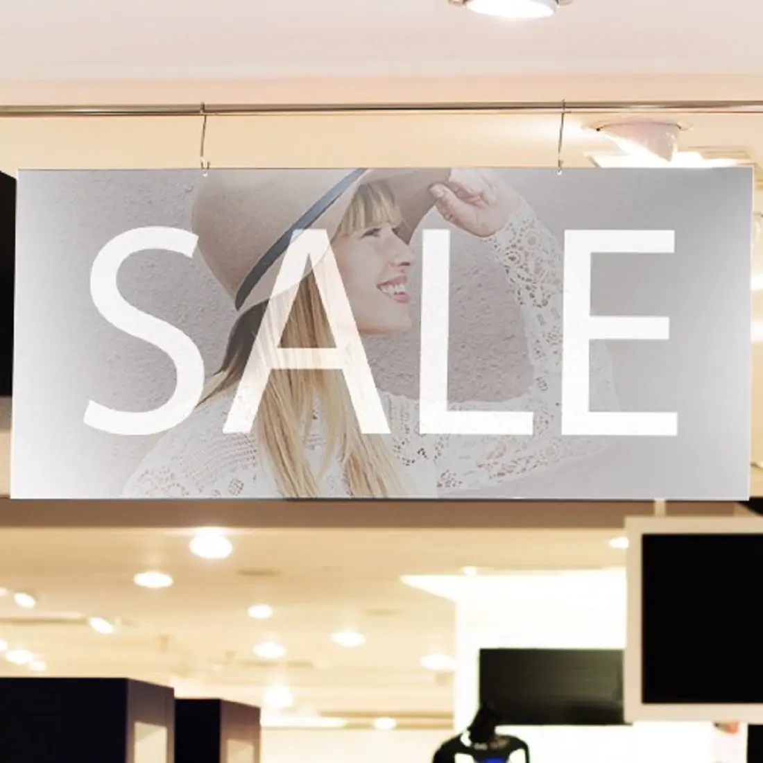 Sale sign with a women in a hat in the background smiling to the side covered in MPI 3300 Gloss /3320 Matte Grey Perm
