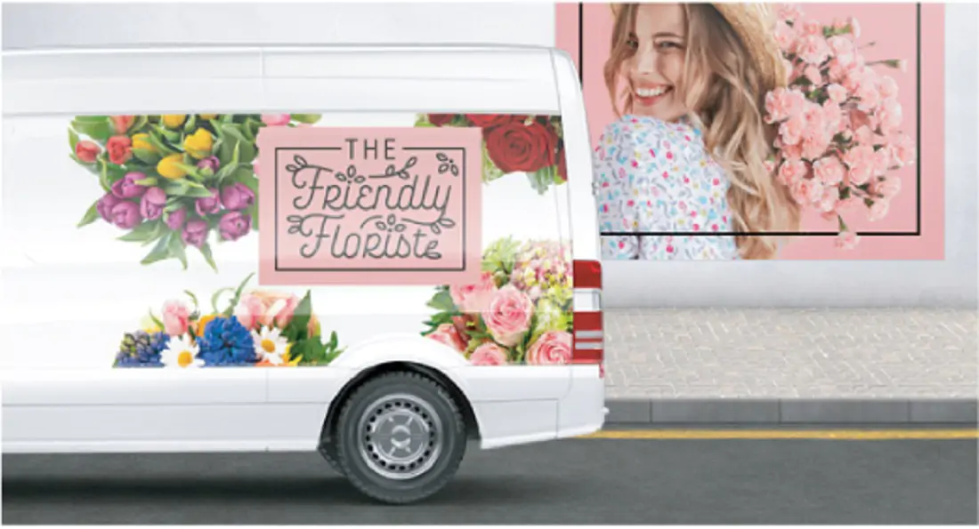 MPI 2105 Gloss EZ & EZRS LTR Removable around a white van with flowers on it and a florist company name on it. In the background on a wall, is a women holding pink flowers and a pink background 