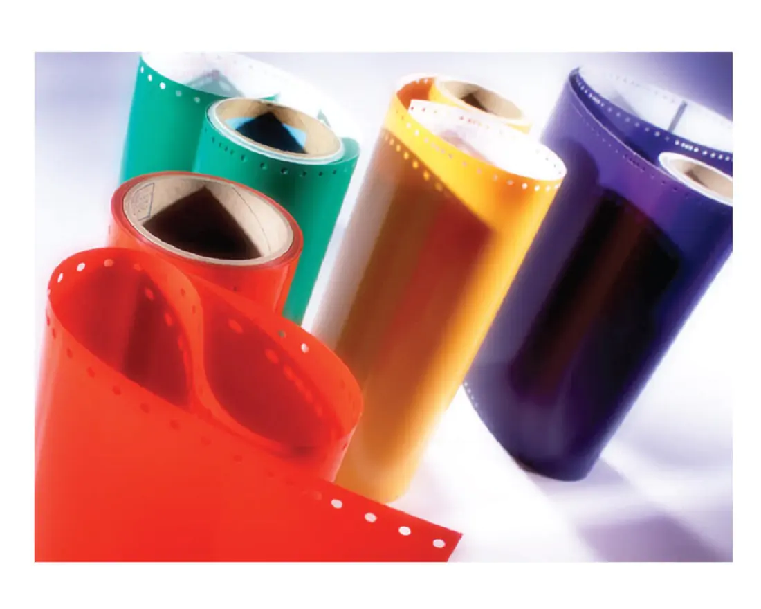 Multiple Vinyl rolls in the colour red, green, yellow and purple 