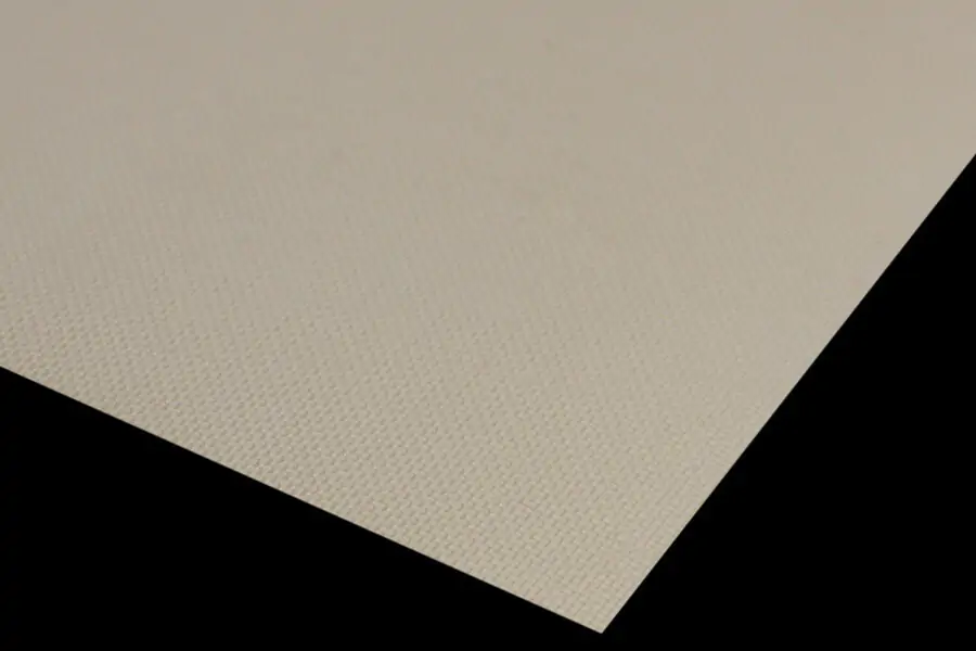 Sheet of HTV No-Stick Silicone paper on black background